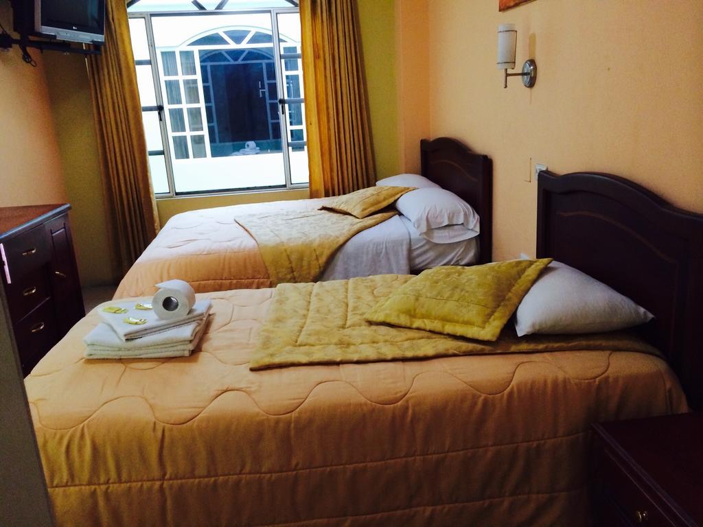 Hostal Grand Rio Baños Habitación foto
